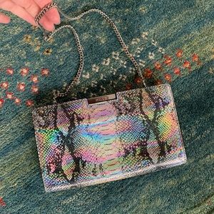 Milly iridescent snakeskin clutch